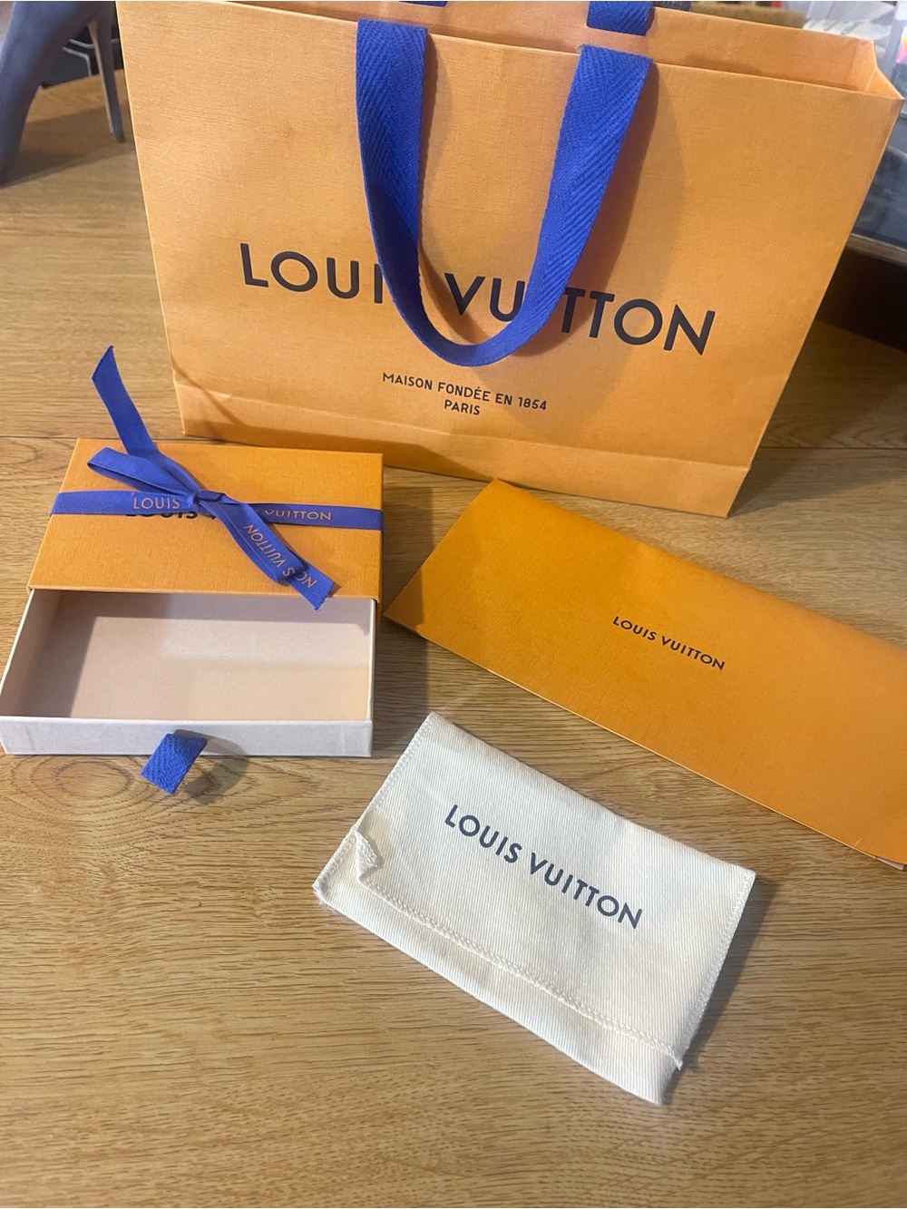 Louis Vuitton Orange Gift Bag, Box and Cream Dust Pouch with Blue Handles